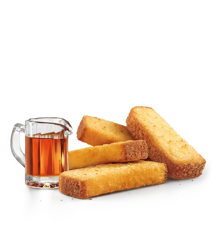 Golden brown French toast sticks from Sonic menu prices served with sweet maple syrup for a classic breakfast treat